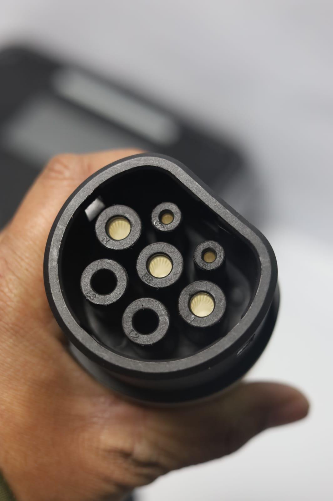 Front view of a Type 2 EV charging connector pin layout.