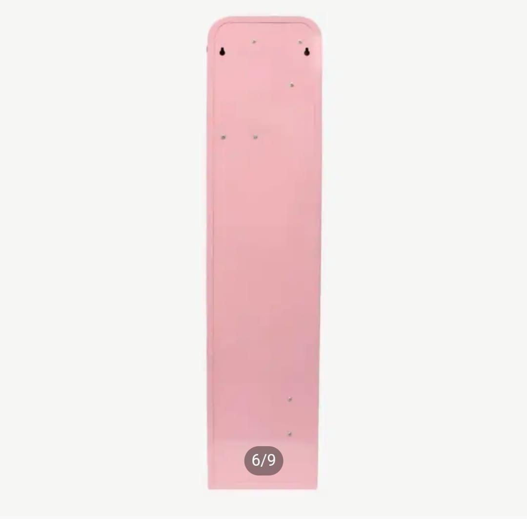 Back panel view of a pink wall-mountable vending machine cabinet showing mounting keyhole slots.