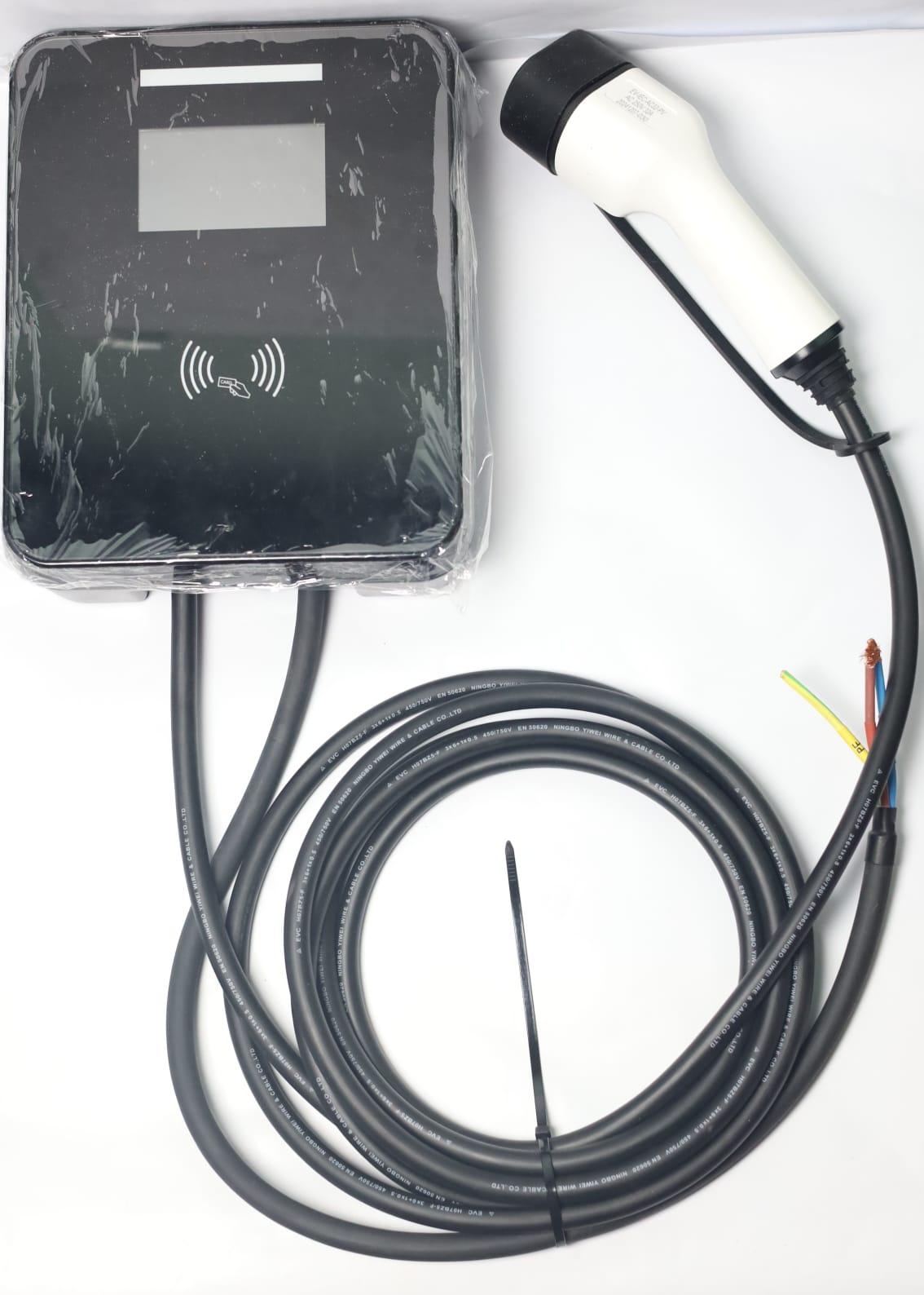 Complete EV home charging kit featuring a wallbox unit, long charging cable, Type 2 connector, and power wiring.