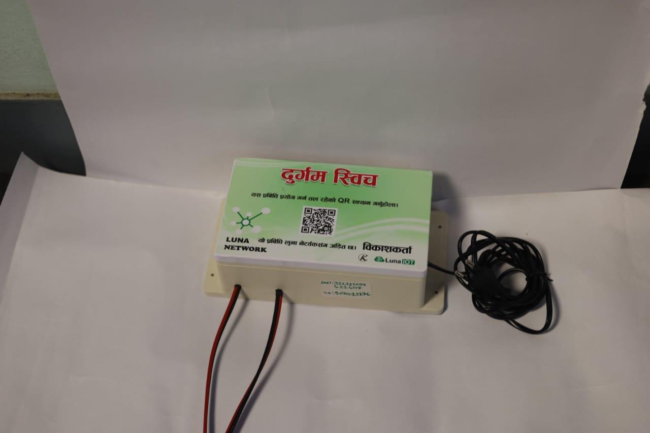 Luna Network "Durgam Switch" IoT controller module featuring a QR code scanner label and power connection leads.